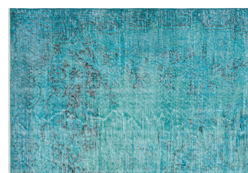 Load image 1 in gallery view. Teal distressed rug with a faded black traditional floral pattern on a white background.