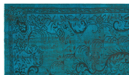Load image 1 in gallery view. Teal rug with a black distressed floral pattern and a traditional border.