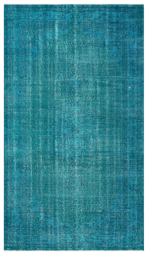 Load image 1 in gallery view. Teal distressed traditional rug with a faded central medallion and ornate border on a white background.