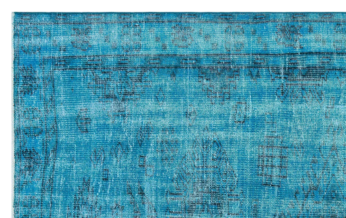 Load image 1 in gallery view. Bright turquoise distressed rug with a faded traditional medallion pattern and dark blue border details.