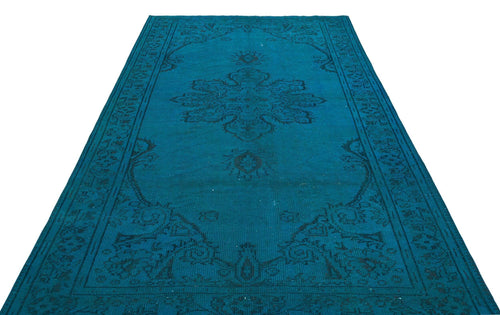 Load image 1 in gallery view. Teal rug with a dark blue traditional medallion pattern and ornate border on a white background.