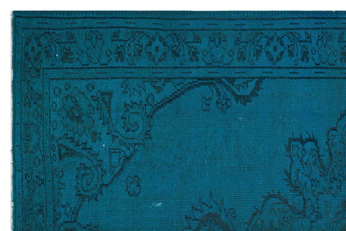 Load image 1 in gallery view. Teal rug with a dark blue traditional floral border and corner medallion pattern on a white background.