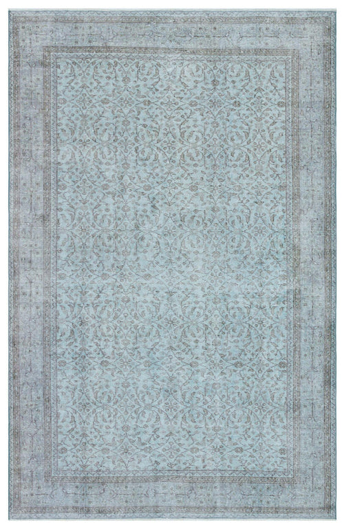 Load image 1 in gallery view. Light blue and grey distressed rug with a traditional floral medallion pattern and a bordered edge.