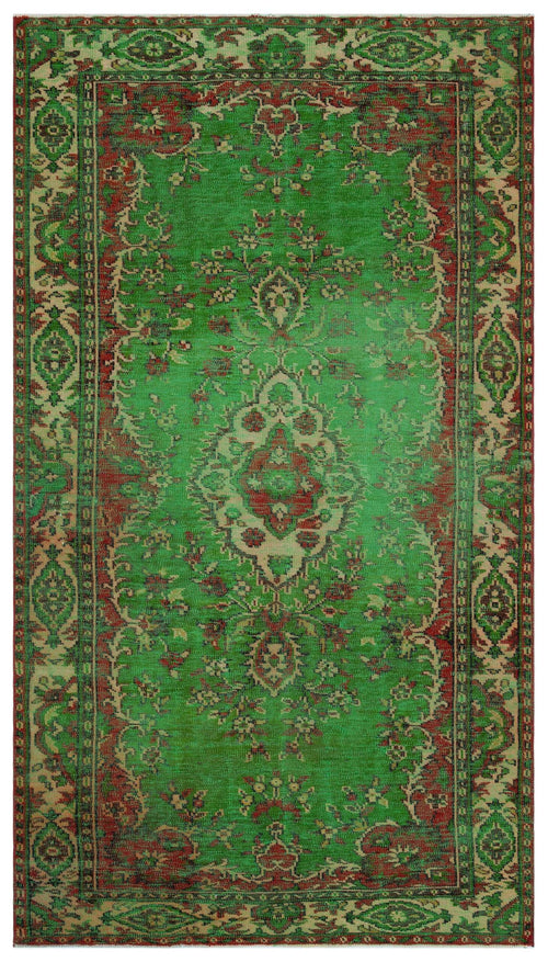 Load image 1 in gallery view. Green and red traditional rug with a central floral medallion and ornate border pattern.