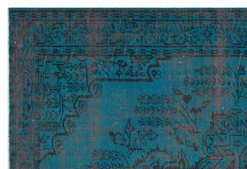 Load image 1 in gallery view. Teal and black rug with a distressed traditional floral medallion pattern and a geometric border.