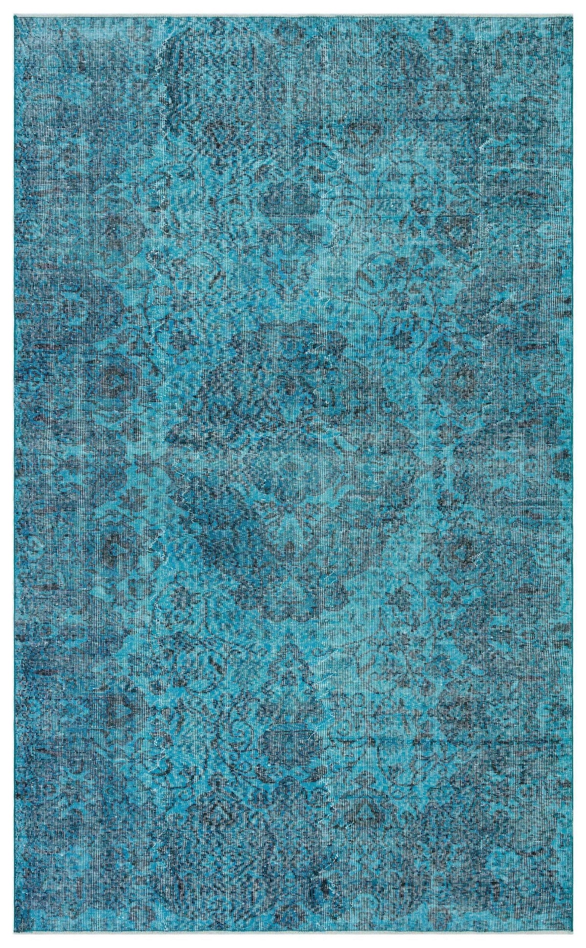 Teal and navy blue distressed rug with a traditional floral medallion pattern.