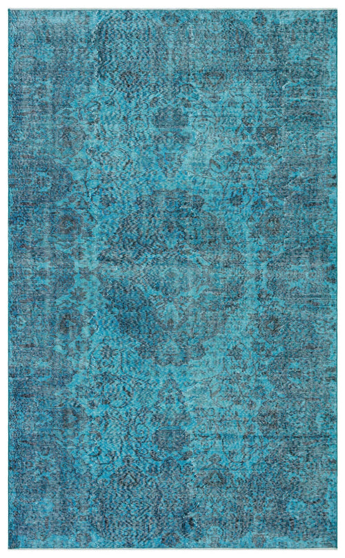 Load image 1 in gallery view. Teal and navy blue distressed rug with a traditional floral medallion pattern.