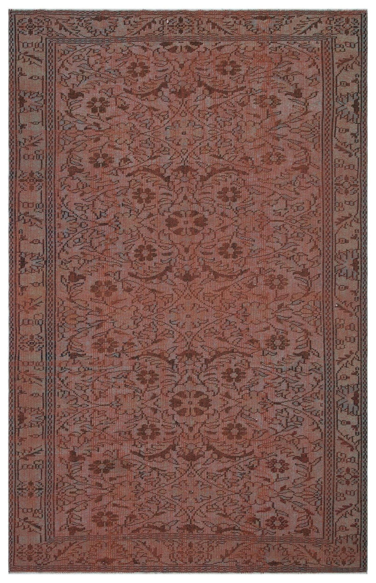 Terracotta and grey traditional rug with a distressed floral medallion pattern and a detailed geometric border.