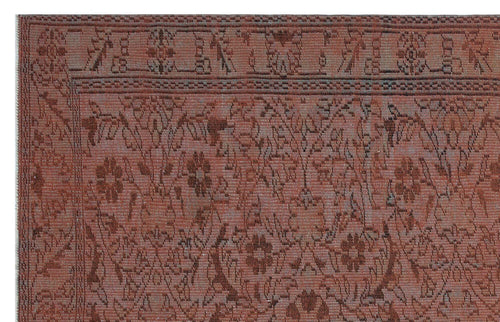 Load image 1 in gallery view. Terracotta and charcoal traditional rug with a distressed floral pattern and a geometric border.