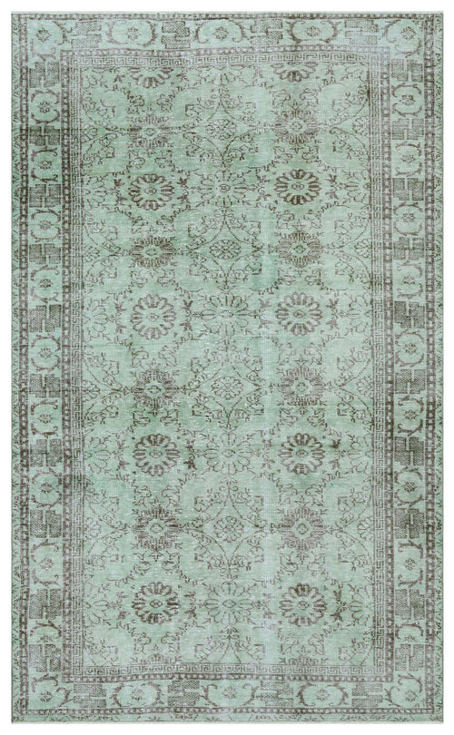 Load image 1 in gallery view. Sage green and brown traditional rug with a distressed floral medallion pattern and a geometric border.
