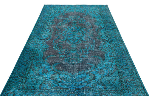 Load image 1 in gallery view. Teal and charcoal distressed area rug with a traditional central medallion and ornate border pattern.