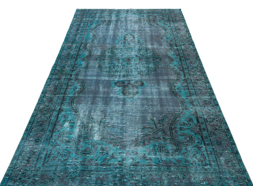 Load image 1 in gallery view. Teal and charcoal distressed vintage-style rug with a central medallion and ornate border on a white background.