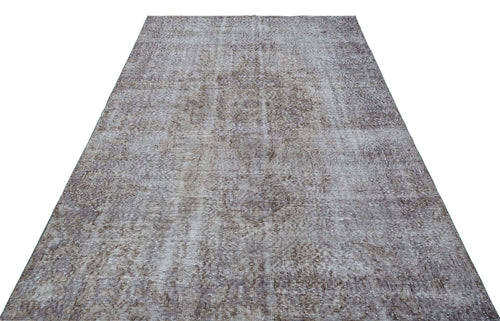 Load image 1 in gallery view. Grey and white distressed vintage-style rug with a faded traditional medallion pattern on a white background.