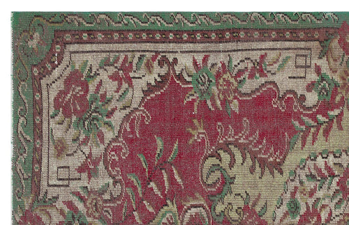 Load image 1 in gallery view. Distressed traditional rug with a red central field, beige borders, and green and burgundy floral motifs.
