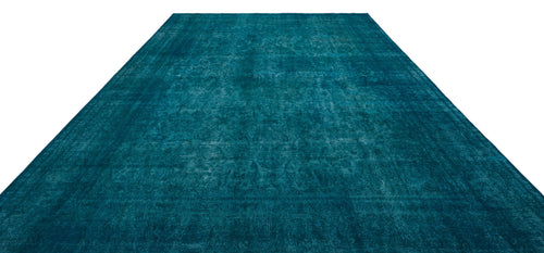 Load image 1 in gallery view. Teal monochromatic rug with a distressed, faded traditional medallion pattern.