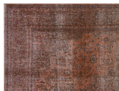Load image 1 in gallery view. Distressed rust-colored rug with a traditional floral medallion pattern and a dark, intricate border.