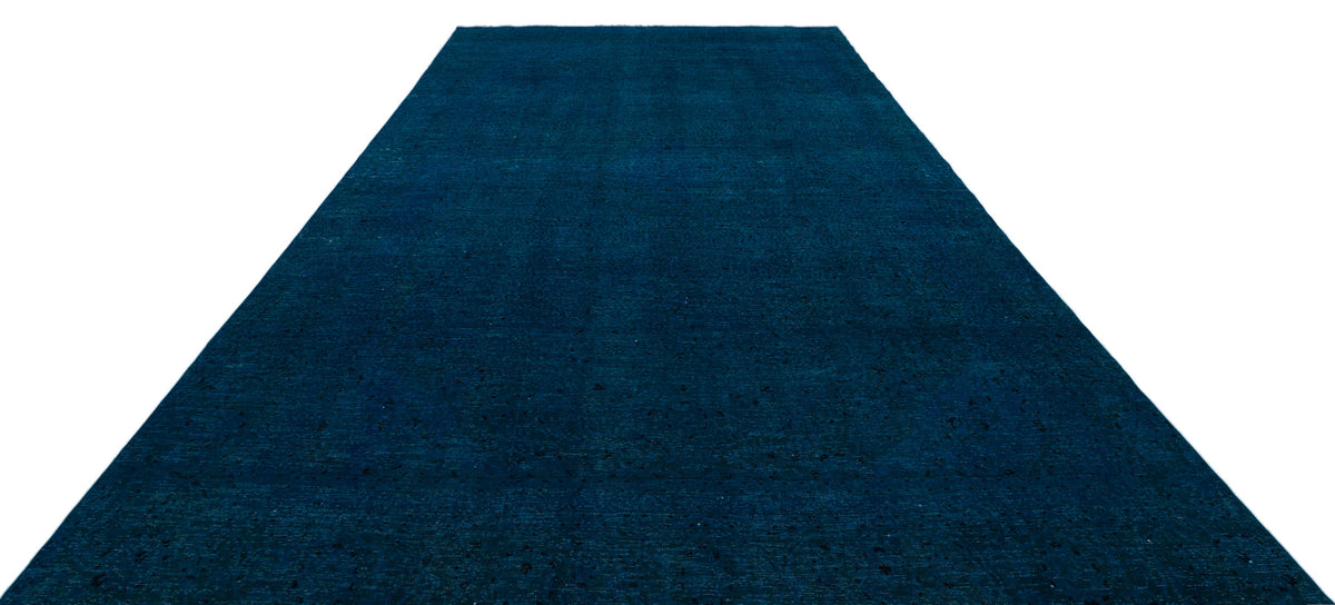 Solid deep navy blue rug with a subtle distressed texture on a white background.