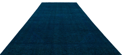 Load image 1 in gallery view. Solid deep navy blue rug with a subtle distressed texture on a white background.