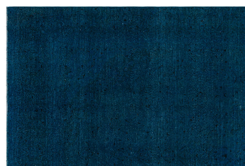 Load image 1 in gallery view. Deep teal rug with a distressed, monochromatic texture and subtle, faded traditional motifs.