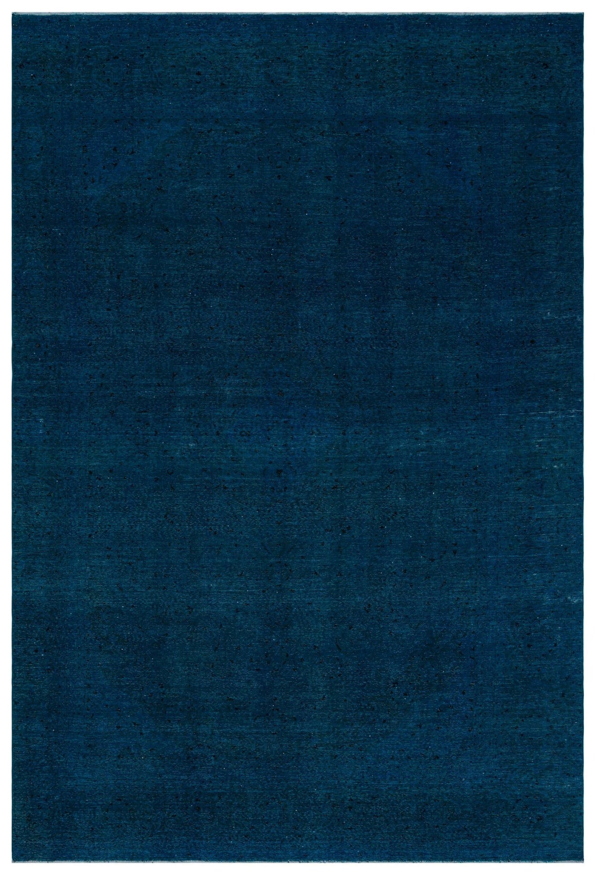 Solid deep navy blue rug with a subtle, distressed speckled texture.