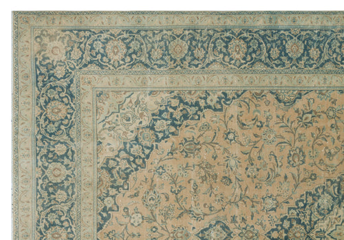 Load image 1 in gallery view. Beige and teal traditional rug with a distressed floral medallion pattern and intricate border.