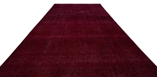 Load image 1 in gallery view. Deep burgundy vintage-style rug with a subtle, distressed monochromatic pattern on a white background.