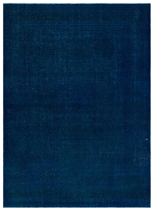 Load image 1 in gallery view. Deep navy blue rug with a subtle, distressed traditional medallion pattern and white speckled accents.