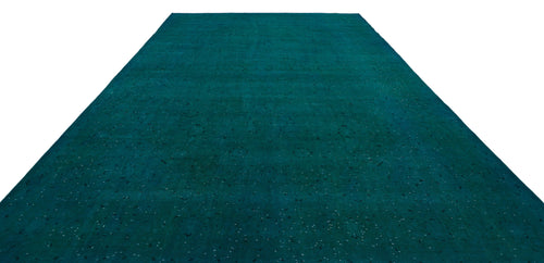 Load image 1 in gallery view. Solid teal rug with a distressed, speckled texture on a white background.
