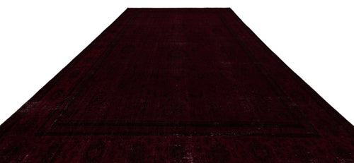 Load image 1 in gallery view. Deep burgundy traditional rug with a subtle, dark-toned ornate medallion pattern and a wide border.