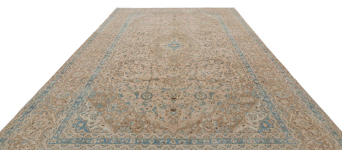 Load image 1 in gallery view. Beige and light blue traditional Persian-style rug with a central floral medallion and intricate border pattern.