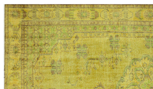 Load image 1 in gallery view. Yellow and lime green vintage-style rug with a distressed traditional floral medallion pattern.