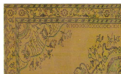 Load image 1 in gallery view. Mustard yellow vintage-style rug with dark brown and green floral border and corner medallion motifs.