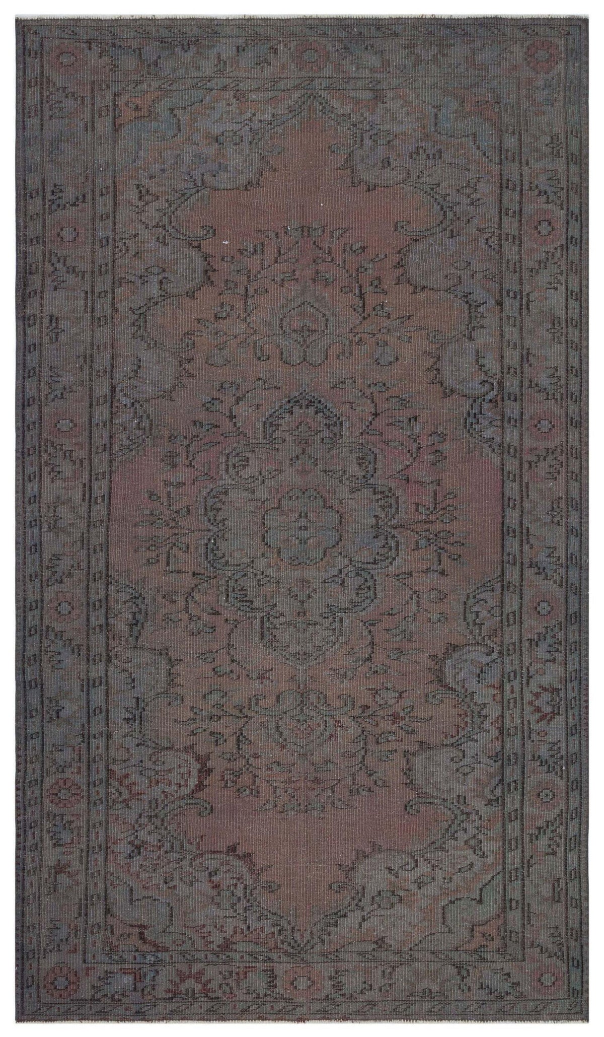Muted terracotta and charcoal grey traditional rug with a central floral medallion and ornate border.