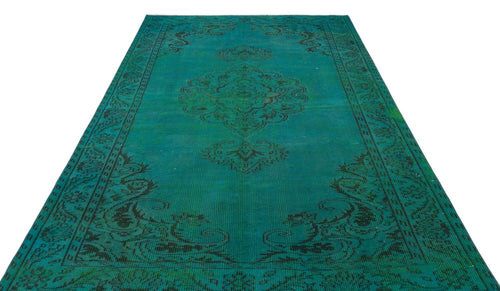 Load image 1 in gallery view. Teal rug with a distressed black traditional medallion pattern and ornate border on a white background.