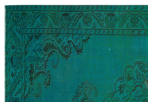Load image 1 in gallery view. Teal rug with a black traditional floral medallion pattern and a detailed border.