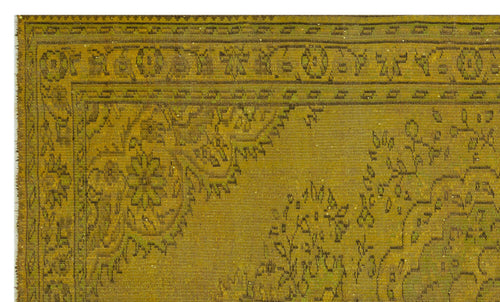 Load image 1 in gallery view. Olive green vintage-style rug with a dark brown traditional floral medallion border and intricate botanical motifs.