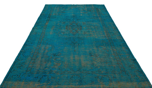 Load image 1 in gallery view. Teal and dark grey distressed rug with a traditional medallion pattern on a white background.