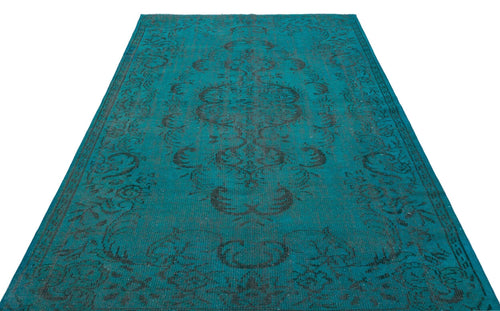 Load image 1 in gallery view. Teal rug with a distressed black traditional floral medallion pattern on a white background.