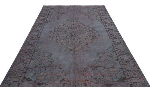 Load image 1 in gallery view. Charcoal and slate blue distressed rug with a central medallion and ornate border pattern on a white background.