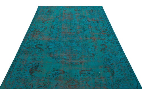 Load image 1 in gallery view. Teal and dark brown vintage-style rug with a distressed traditional floral medallion pattern on a white background.