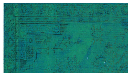 Load image 1 in gallery view. Teal and emerald green rug with a distressed, faded traditional floral medallion pattern and a linear border.