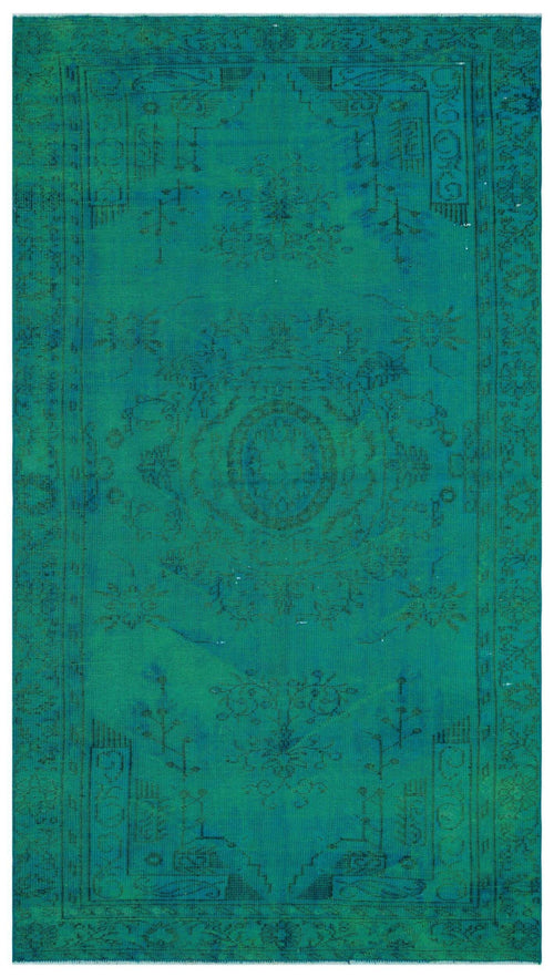 Load image 1 in gallery view. Teal monochromatic rug with a distressed traditional medallion pattern and a decorative border.