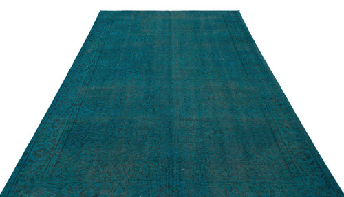 Load image 1 in gallery view. Teal rectangular rug with a faint, distressed traditional medallion pattern and a bordered edge on a white background.