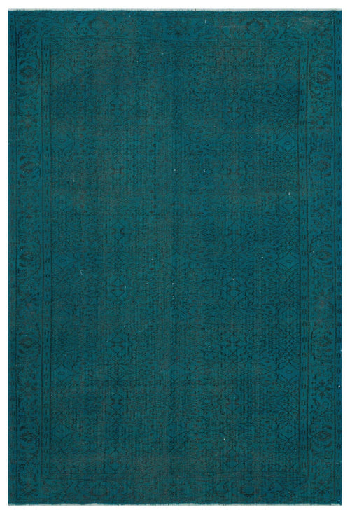 Load image 1 in gallery view. Teal monochromatic rug with a subtle, distressed traditional floral pattern and a decorative border.