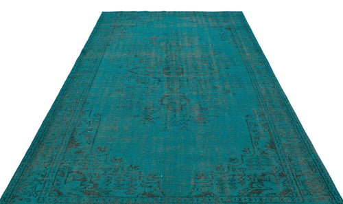 Load image 1 in gallery view. Teal and charcoal distressed traditional rug with a central medallion pattern on a white background.