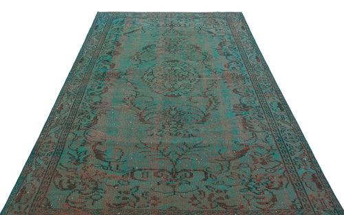 Load image 1 in gallery view. Teal and dark brown distressed vintage-style rug with a central medallion and ornate floral border.
