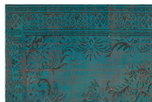 Load image 1 in gallery view. Teal and black rug with a distressed traditional floral medallion pattern and a geometric border.