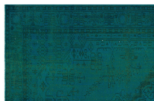 Load image 1 in gallery view. Teal monochromatic rug with a distressed traditional Persian-style pattern and a geometric border.