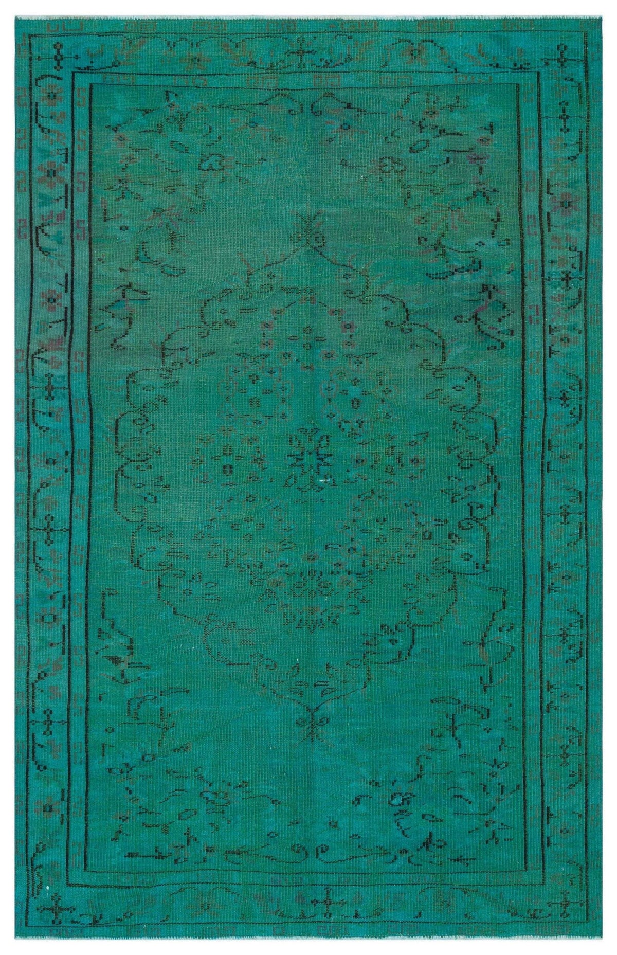 Teal vintage-style rug with a central floral medallion and geometric border in black, isolated on a white background.