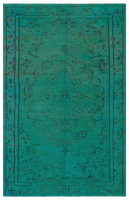 Load image 1 in gallery view. Teal vintage-style rug with a central floral medallion and geometric border in black, isolated on a white background.